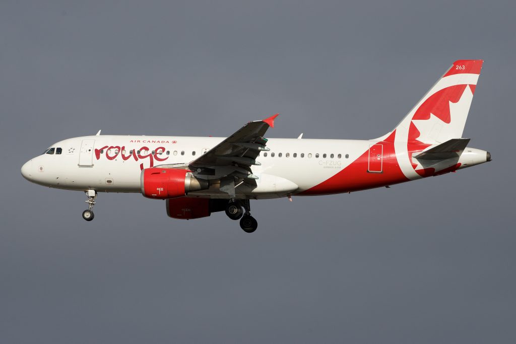 Air Canada Rouge A319 aborts departure in Toronto after a baggage handler becomes trapped in the cargo hold, sparking delays, crew changes, and an eventual flight cancellation