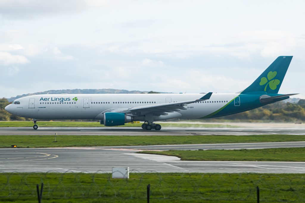 Aer Lingus has suspended all Manchester–US ticket sales as its long‑haul base faces closure, putting routes and jobs at risk while consultations and union action continue.