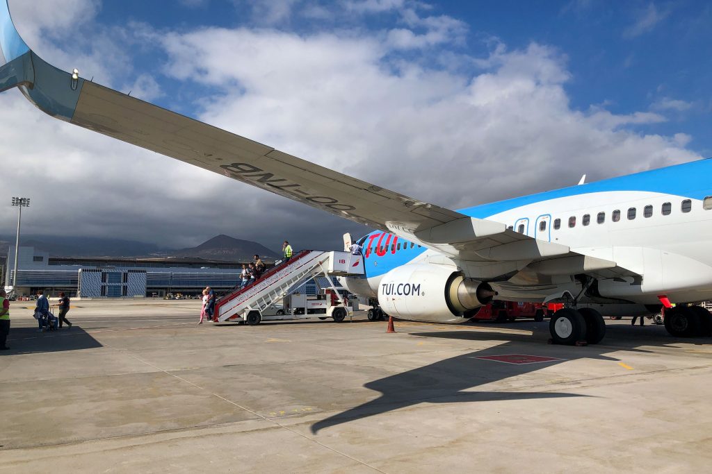 Elderly man arrested at Tenerife South Airport after attempting to wheel his deceased wife through the terminal, prompting a police investigation.