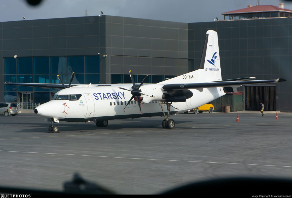 A StarSky F50 suffers a runway excursion and cliff fall after returning to Mogadishu with a technical fault. All 55 onboard survive as investigators probe the cause.
