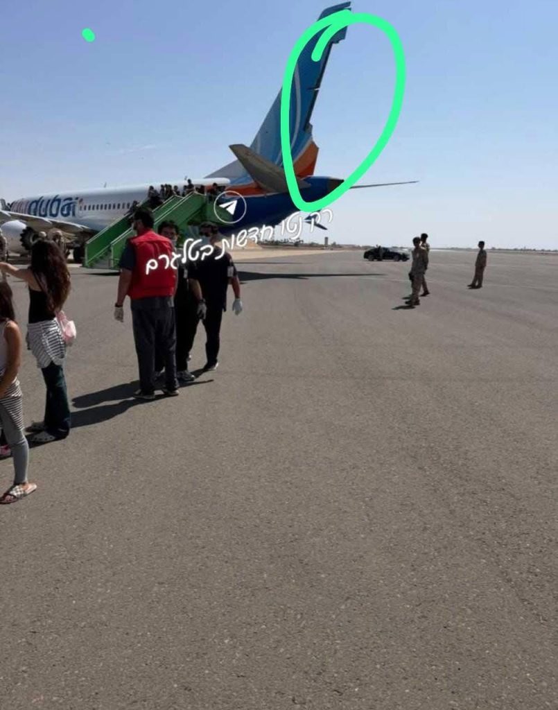 Damage to flydubai Boeing 737-800 after diverting to Tabruk.