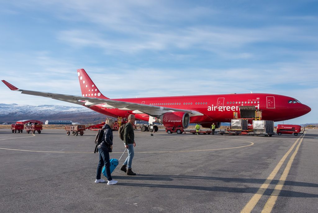 Ilulissat Airport: Air Greenland Airbus A330-200 passenger jet (OY-GRN) at Kangerlussuaq Airport (SFJ), Greenland, loading for fl
