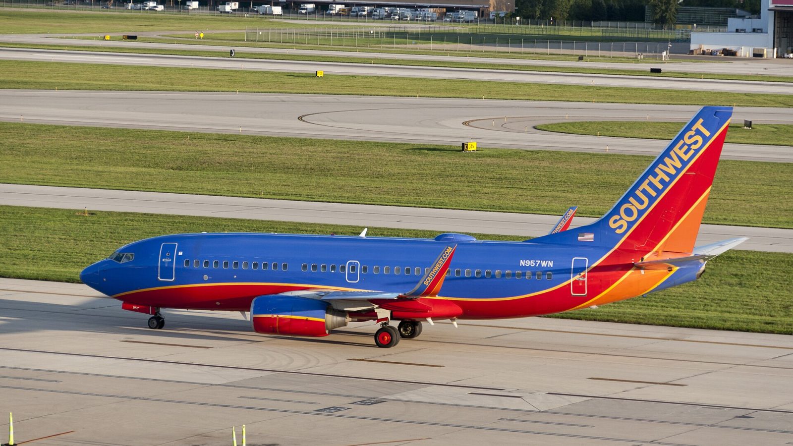 Southwest Airlines: A Southwest Boeing 737-700 with the Tail number N957WN, preparing to take off on an August evening from KCMH.