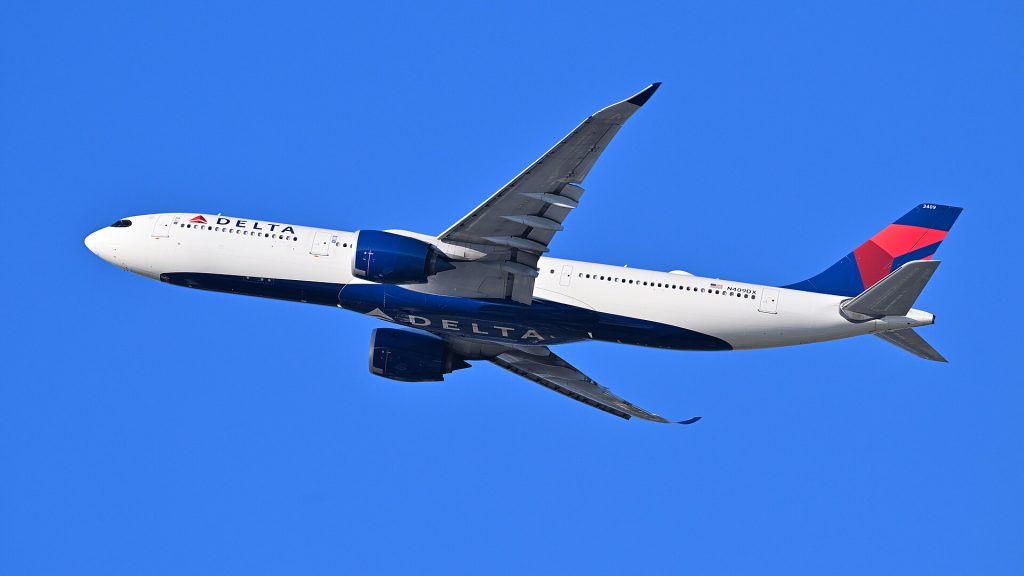 Delta Flight 234: Delta Air Lines Airbus A330-900 N409DX, operating flight 62 to Madrid, departs Boston from runway 33L.