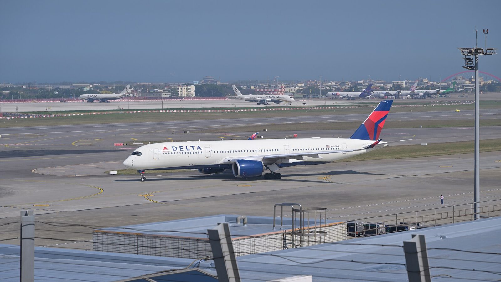 Delta Air Lines Airbus A350-900 N507DN, operating flight 68 to Seattle, taxis for departure at Taiwan Taoyuan