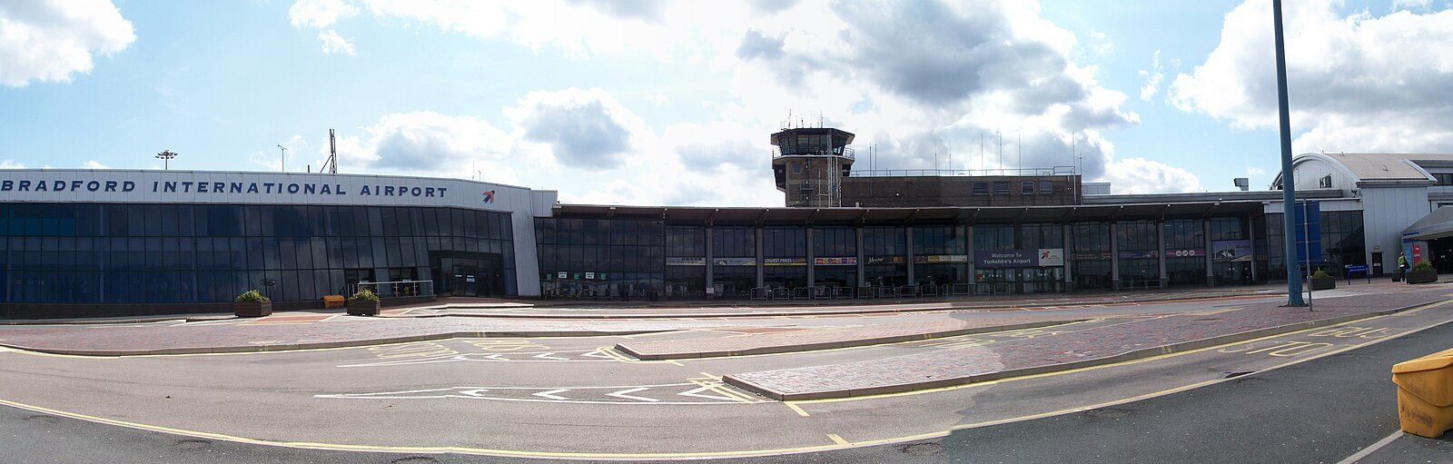 Leeds Bradford Airport strike: A panoramic photograph of the terminal buildings at Leeds Bradford Airport, taken around midday on Saturday 22