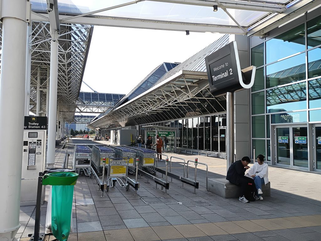 Manchester Airport train: Exterior view of Terminal 2 at Manchester Airport, Greater Manchester, England.