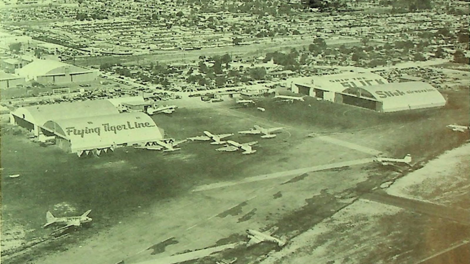 Hollywood Burbank Airport: 1953 photo of Flying Tiger Line and Slick Airways facilities at Lockheed Air Terminal in Burbank