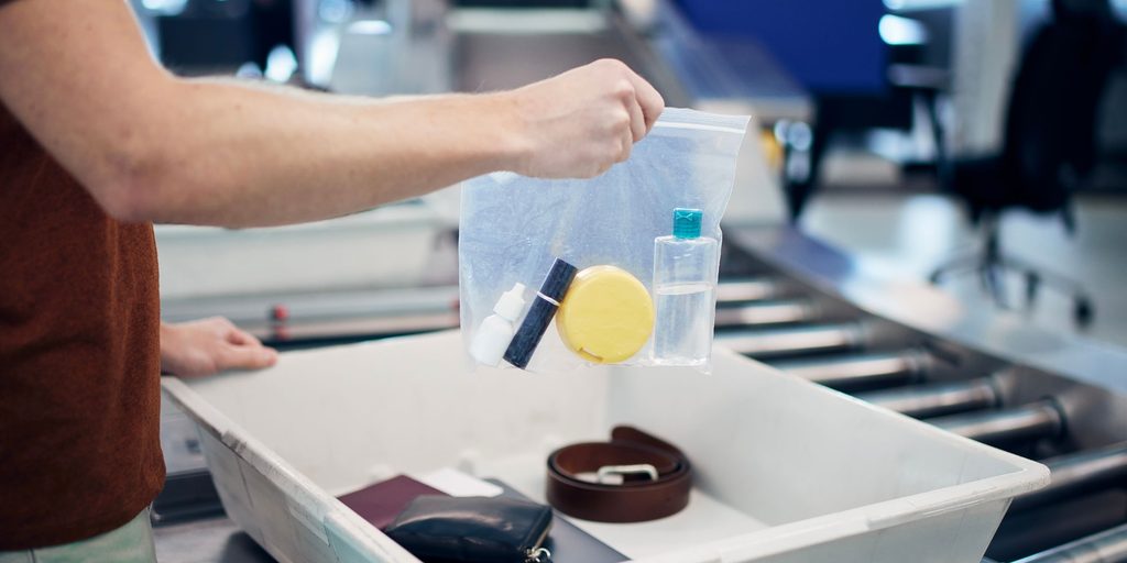 UK airport liquid rules 2026 explained: which airports allow two litre containers, which still enforce 100ml, and the baby milk and medicine exemptions.